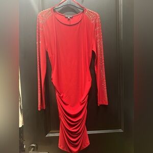 Elegant Red Dress with Embellished Sleeves